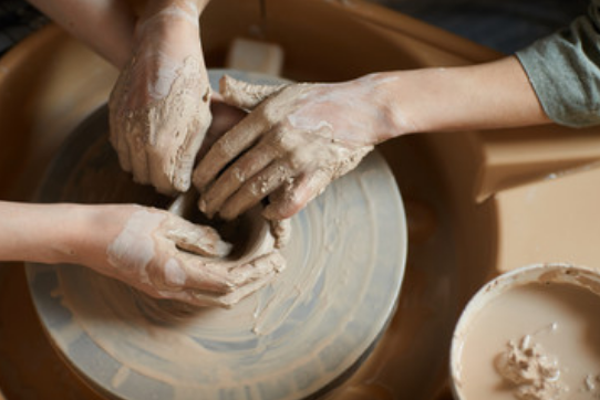 muddy hands pottery wheel